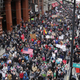 Protesters participate in a march aimed against President Donald Trump’s efforts to crack down on immigration on Feb. 16, 2017, in Chicago. Charles Rex Arbogast / AP